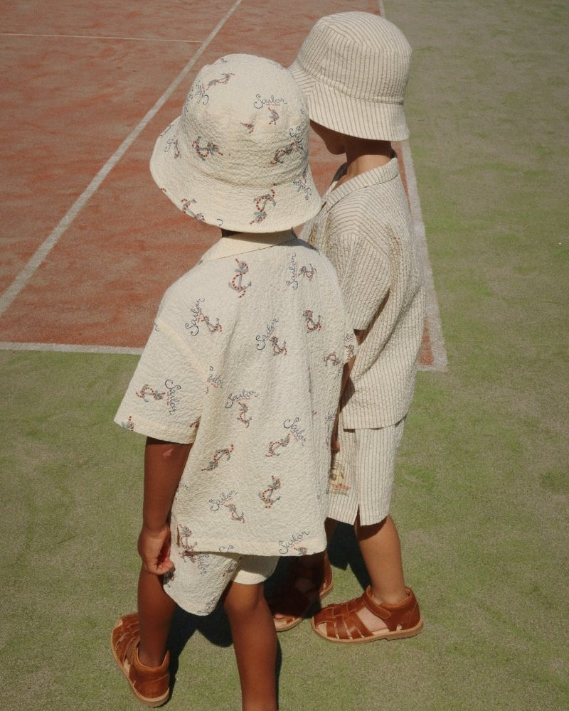 2 Boys Wearing a Bucket Hat
