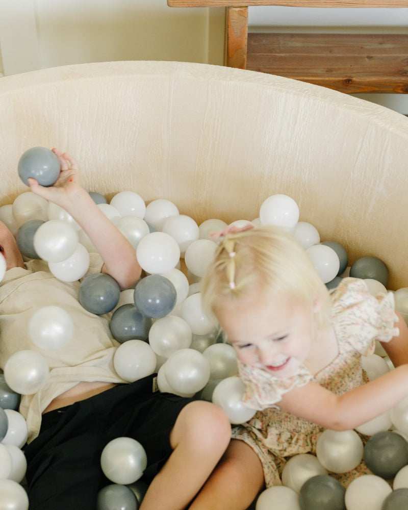 2 Children in Ball Pit