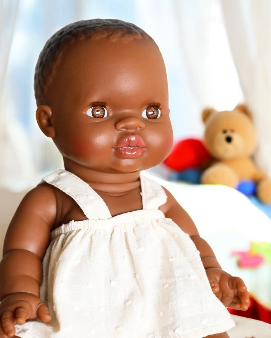 African Baby Girl Light Eyes Playroom