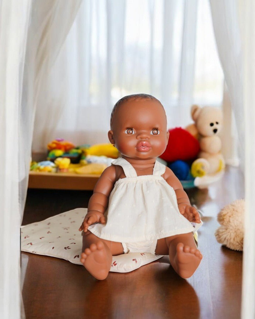 African Baby Girl Light Eyes Playroom