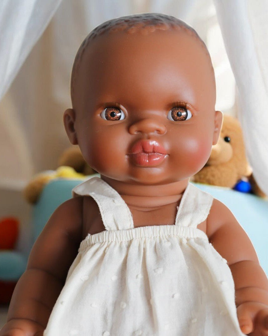 African Baby Girl Light Eyes Playroom