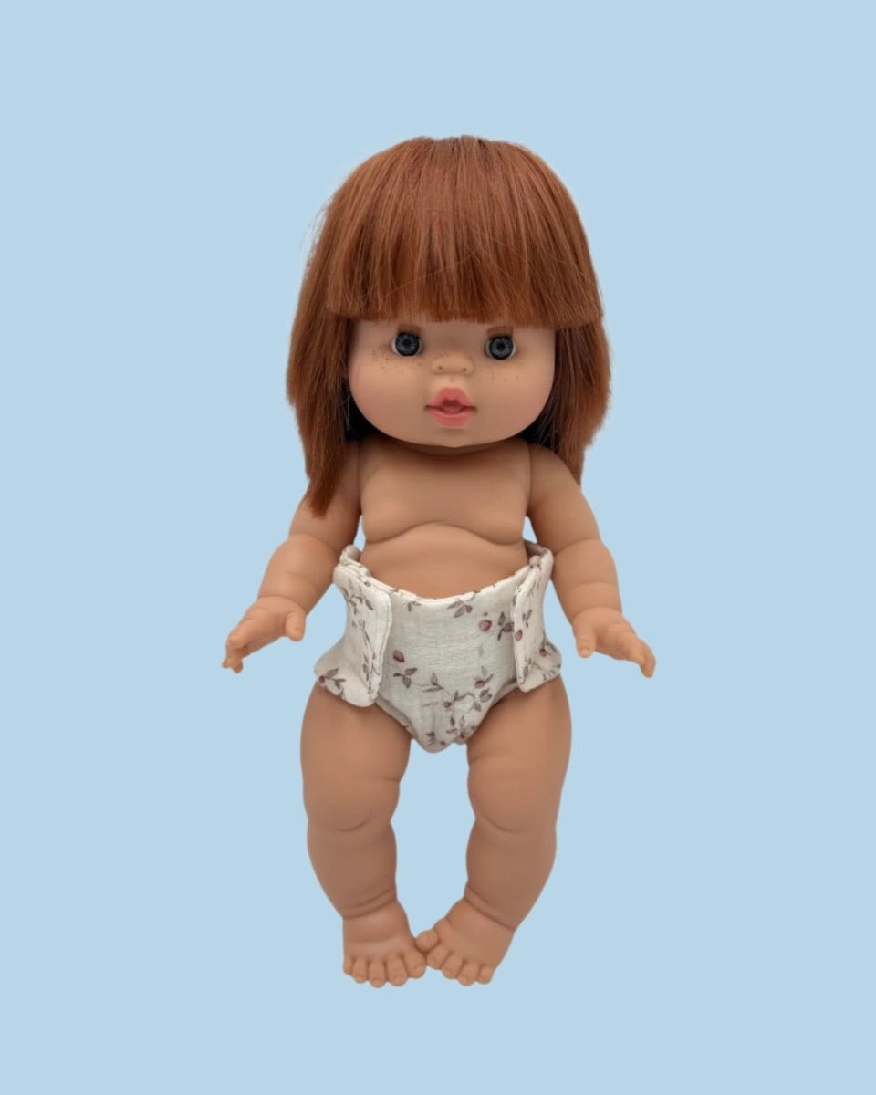 Spring-inspired doll wardrobe pieces with floral patterns