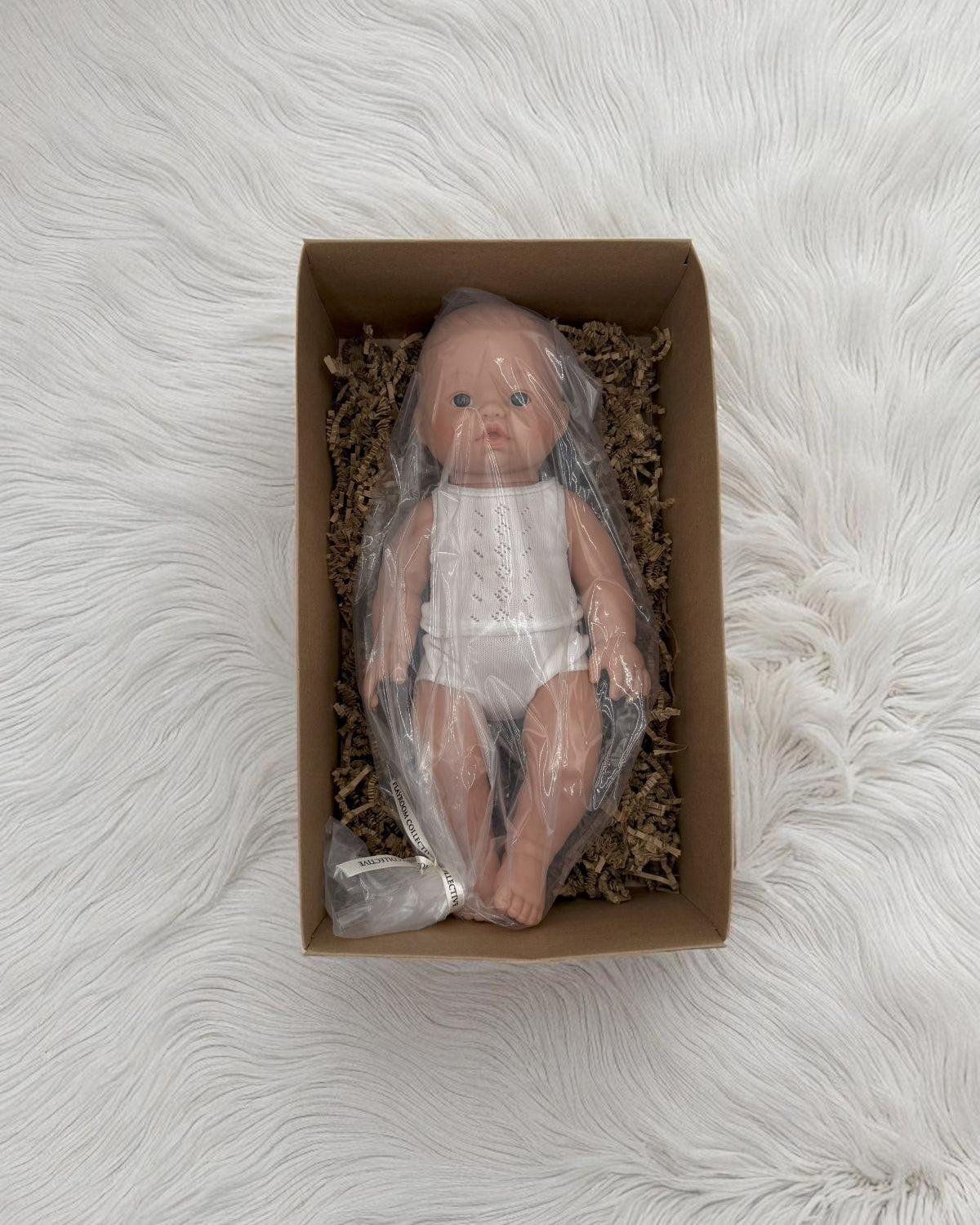 European-designed Troy doll for nurturing play and development