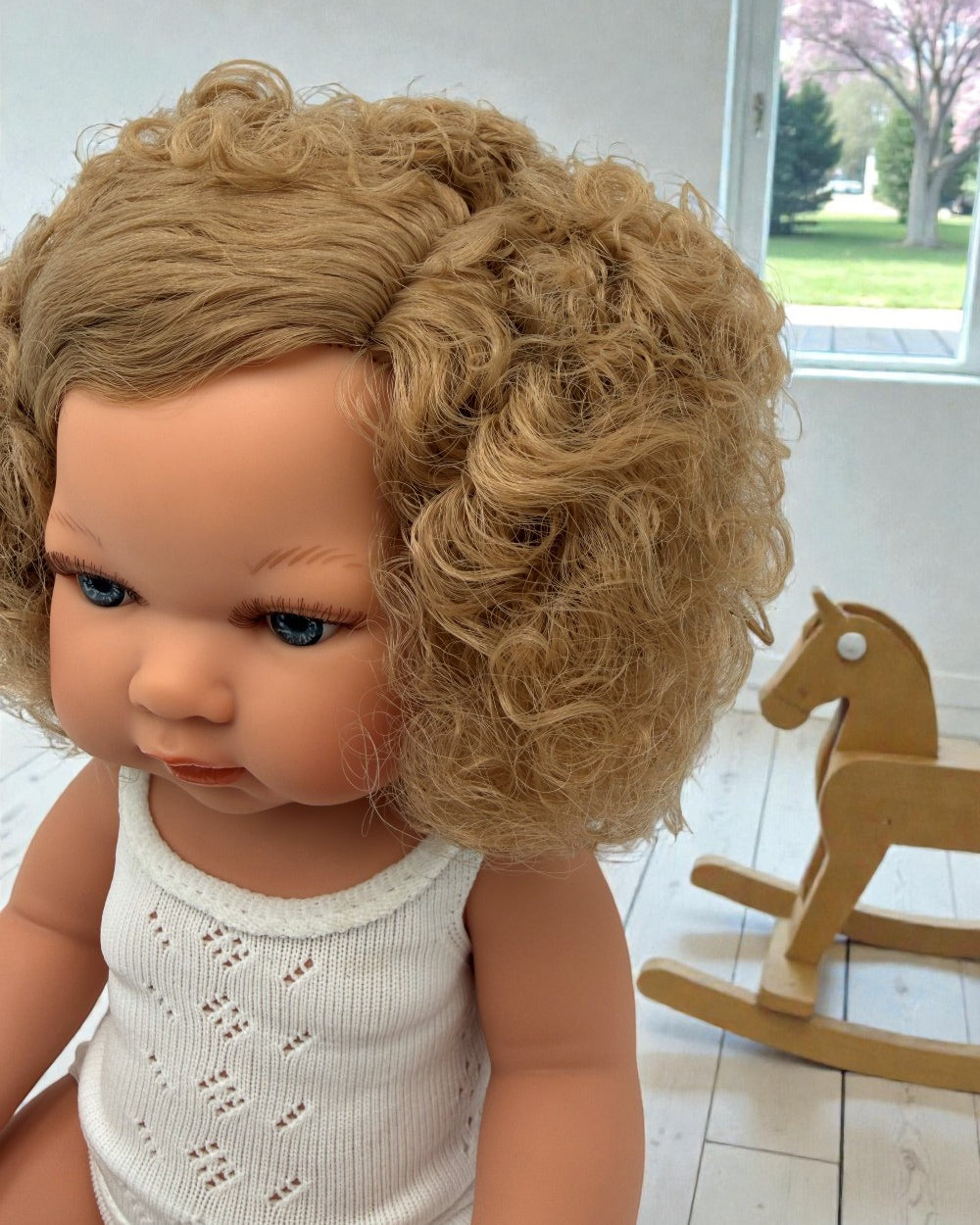 Phthalate-free unscented baby doll with 1-year warranty matching pacifier included