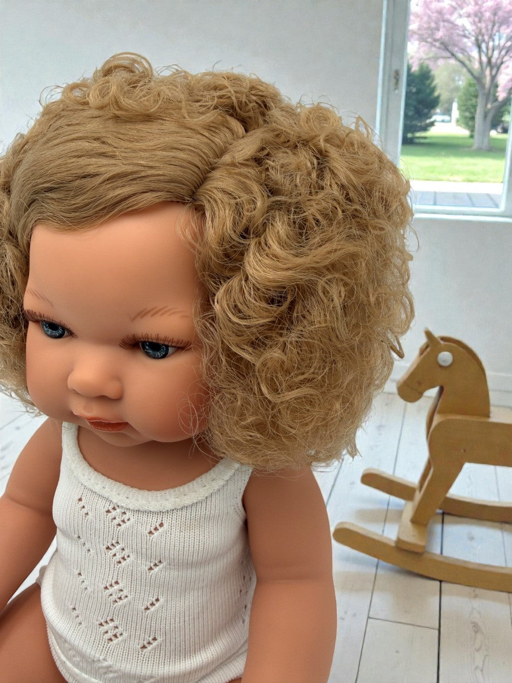 Phthalate-free unscented baby doll with 1-year warranty matching pacifier included