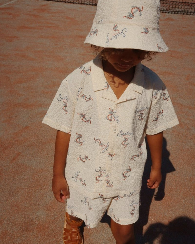 Boy Wearing a Sailor Bucket Hat