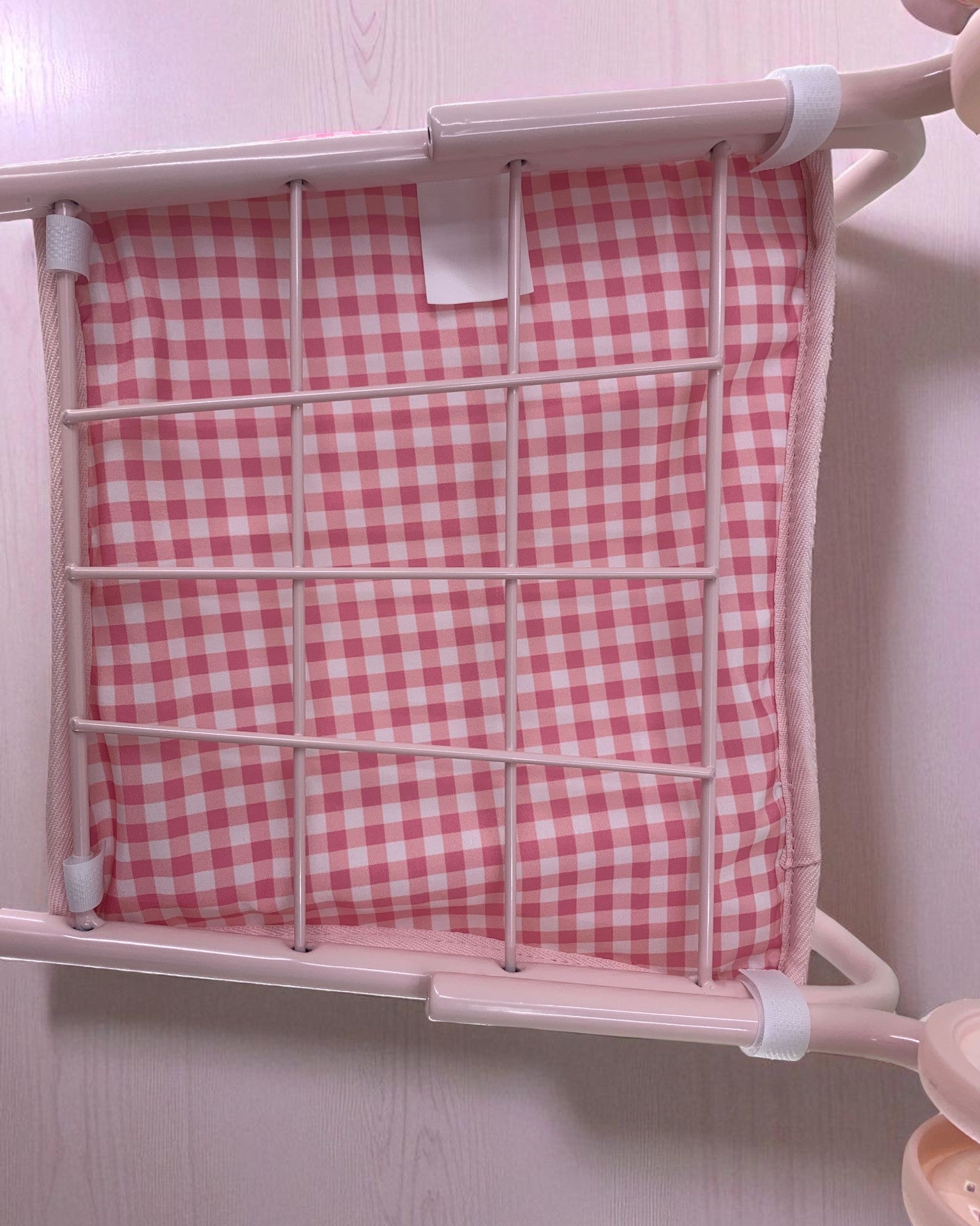 Close-up of Bubblegum Gingham pattern showing classic pink and white checkered design on premium peach skin polyester
