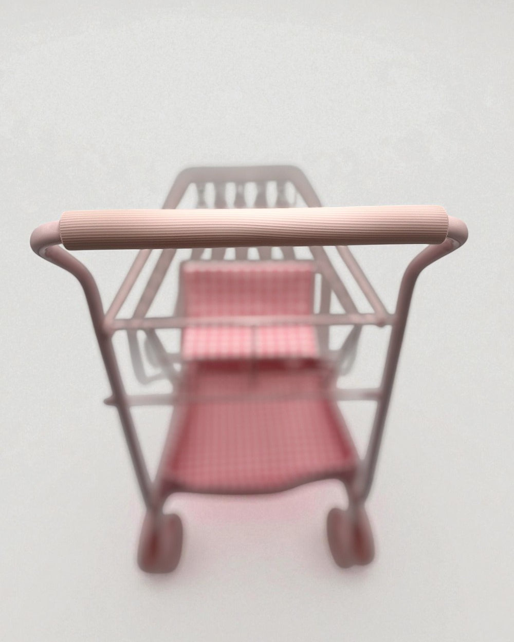 Comfortable EVA foam handle on pink gingham shopping cart designed for small hands during pretend play adventures