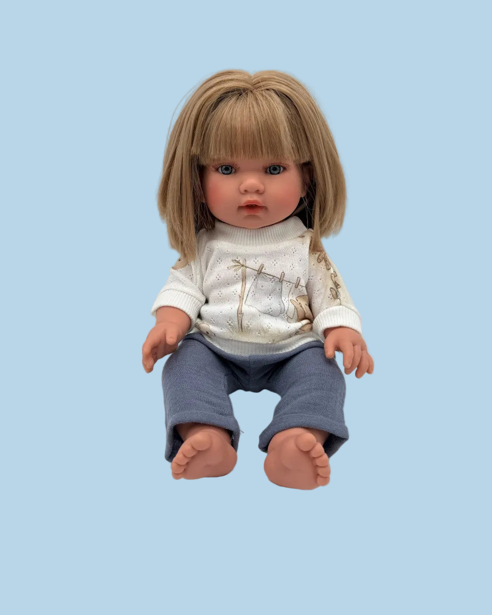 Bebenita doll wearing original bunny print sweater and coordinating grey pants, handmade in Poland