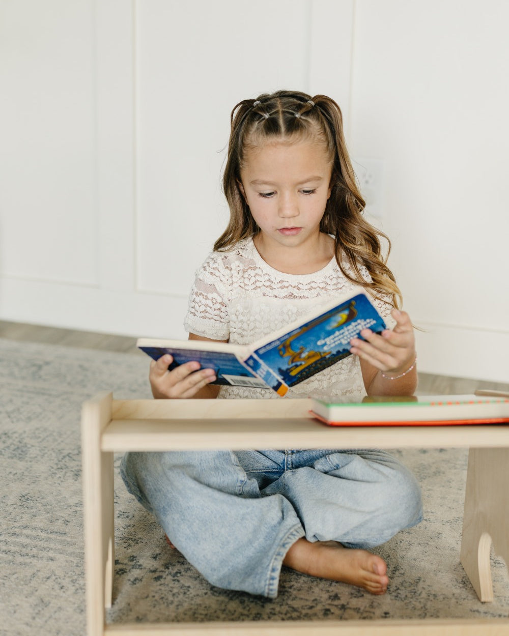 Child Reading at Lap Desk