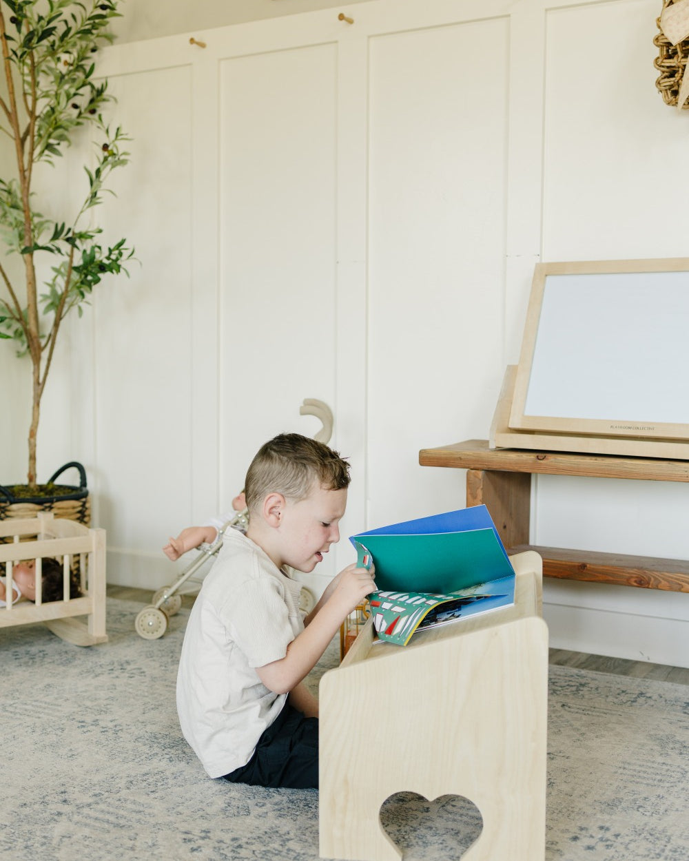 Child Reading on Lap Desk Side View