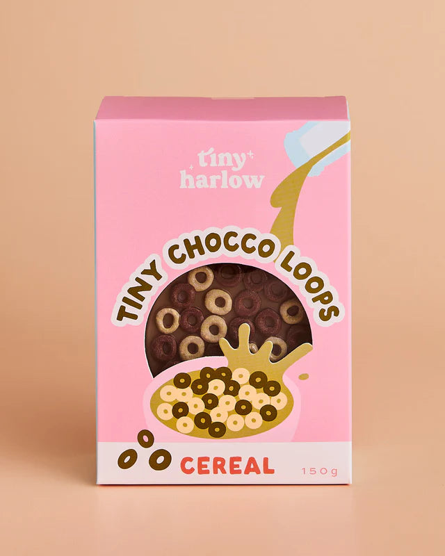 Box of Tiny Choco Loops cereal with pink background