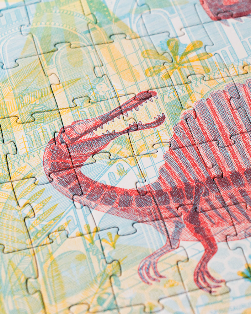 Dinosaur-themed puzzle with a partially completed design on a yellow background