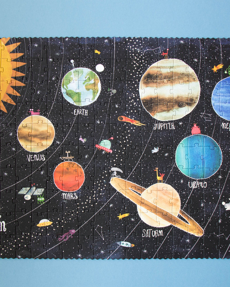 Solar system-themed puzzle on a blue background