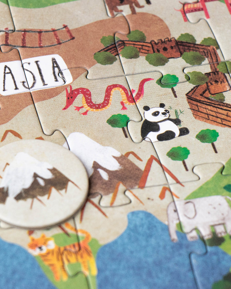Children's puzzle map of Asia with animals and landmarks