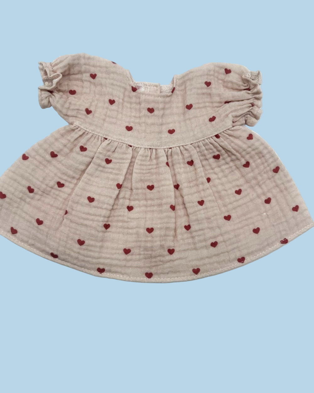 Vintage-inspired doll dress in Dreamy Mauve Hearts print with ruffled short sleeves