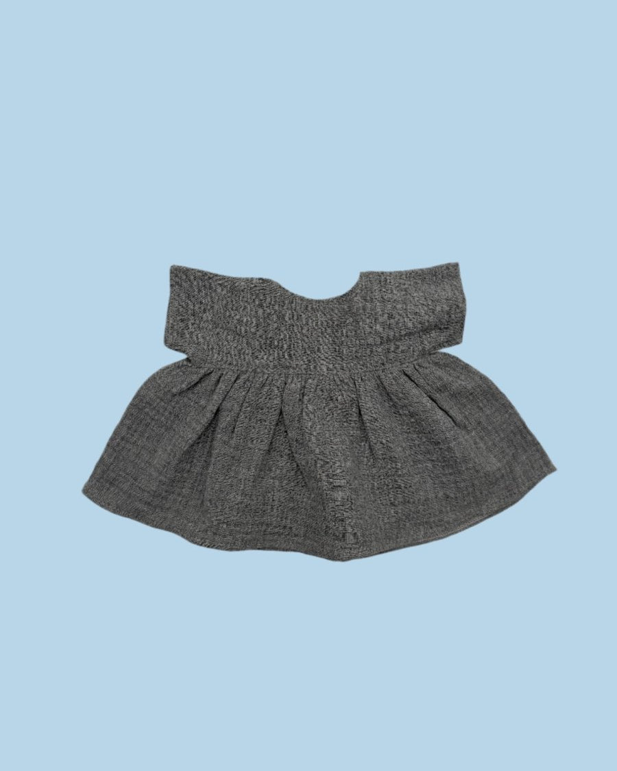 Hand-sewn dolls clothes with unique details