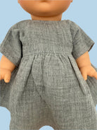 Whimsical baby doll clothes in storytelling themes