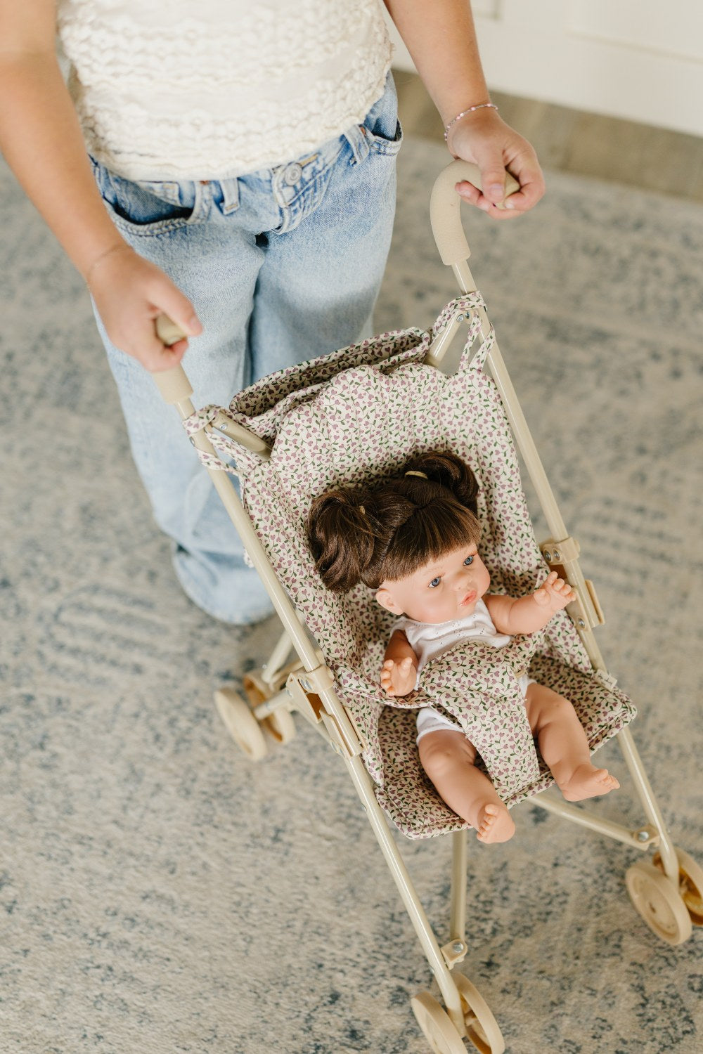 Doll in Doll Stroller