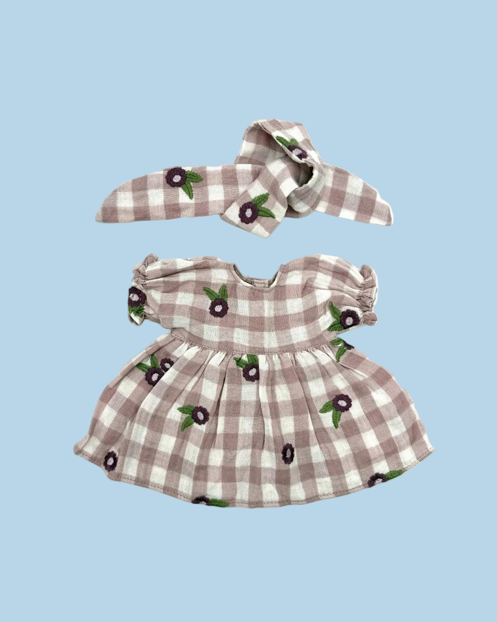 A two-piece doll outfit set featuring a strapless dress and matching headband. The fabric has a brown and white gingham check pattern with small embroidered cherry motifs.