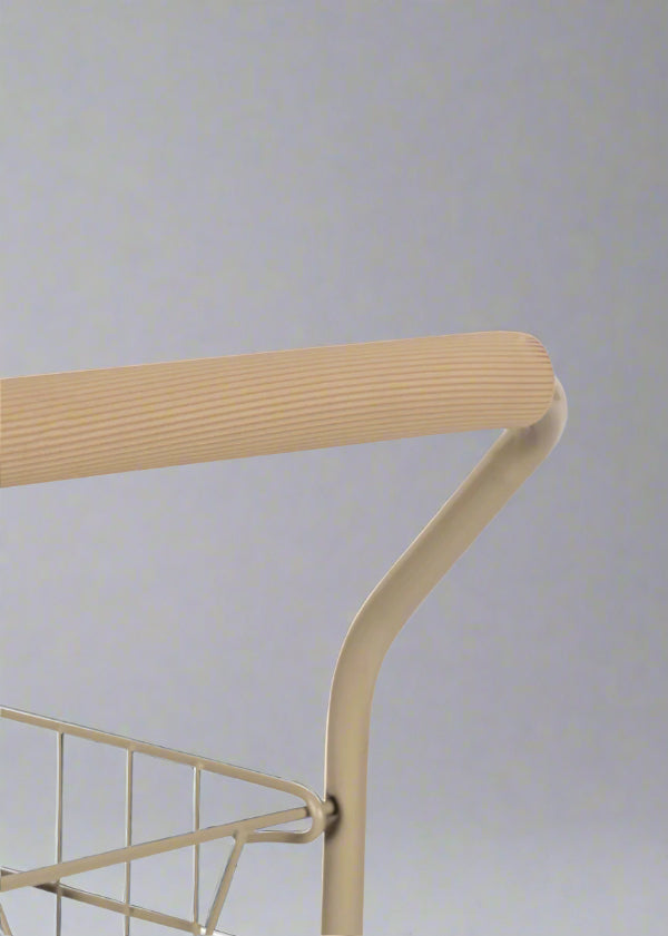 Close-up of Fleur Rosier botanical print fabric featuring blue flowers and pink accents on cream background with tie closure