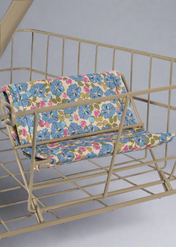 Ergonomic champagne-colored handles with comfortable grip designed for small hands during pretend play shopping adventures