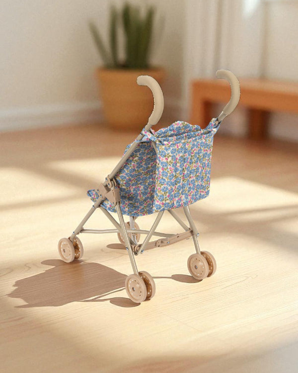 Beautifully arranged Fleur Rosier doll stroller as thoughtful gift for encouraging outdoor play and nurturing doll care