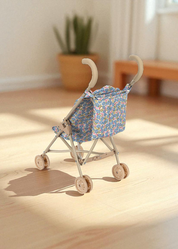 Beautifully arranged Fleur Rosier doll stroller as thoughtful gift for encouraging outdoor play and nurturing doll care