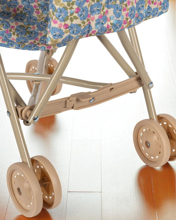 Stroller folding mechanism showing space-saving design and easy storage capability for parents