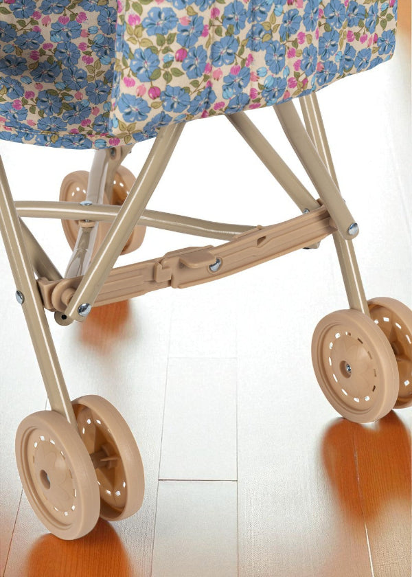 Stroller folding mechanism showing space-saving design and easy storage capability for parents