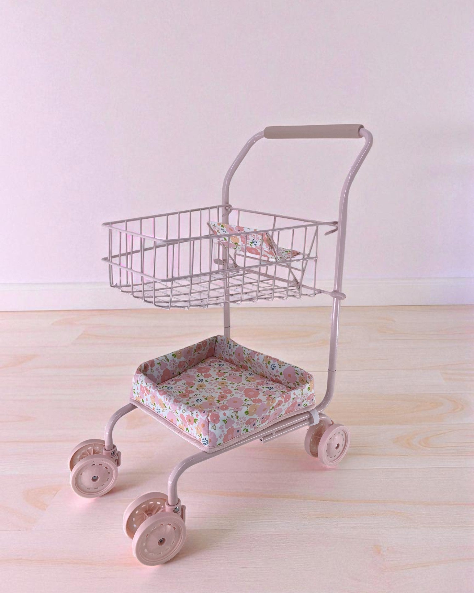 Garden Blush shopping cart with soft pink floral fabric seat, champagne wire basket and smooth-rolling wheels