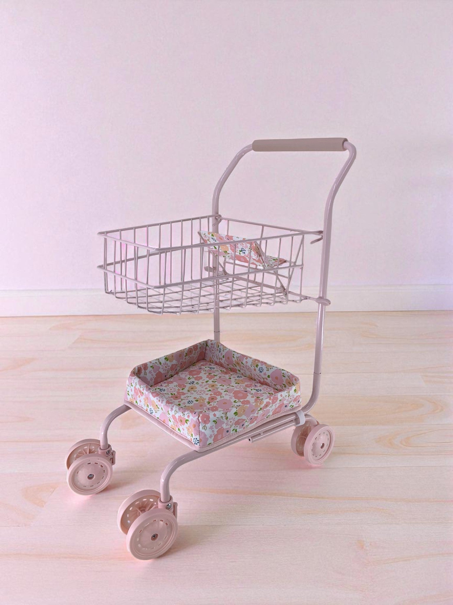 Garden Blush shopping cart with soft pink floral fabric seat, champagne wire basket and smooth-rolling wheels