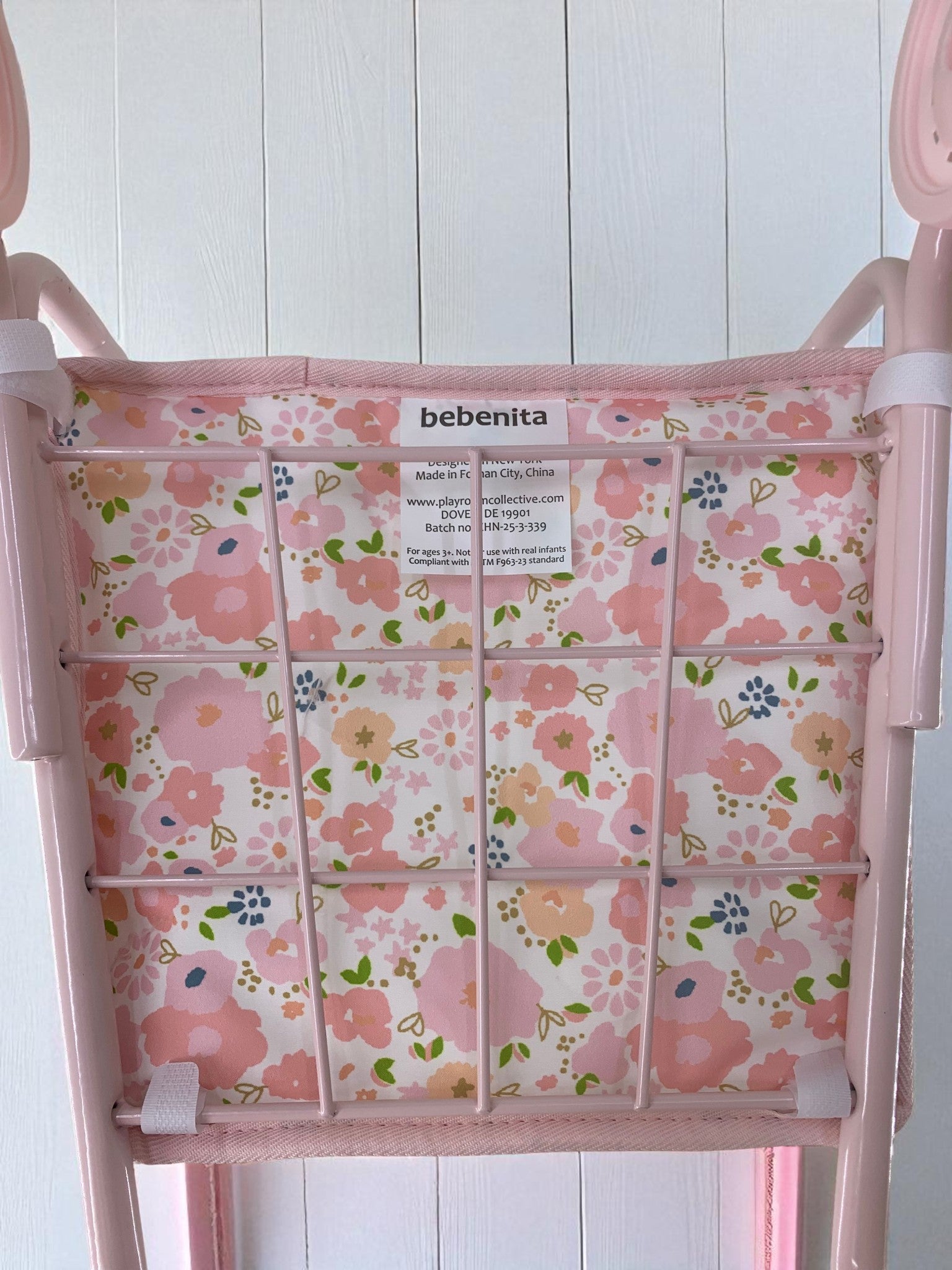 Close-up of Garden Blush pattern showing delicate pink blooms and botanical design on premium peach skin polyester