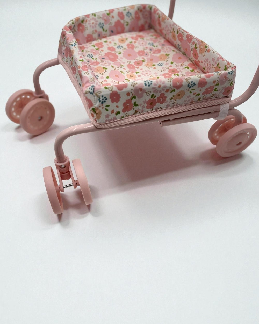 Professional-grade front wheels on shopping cart showing smooth-rolling capability for easy navigation