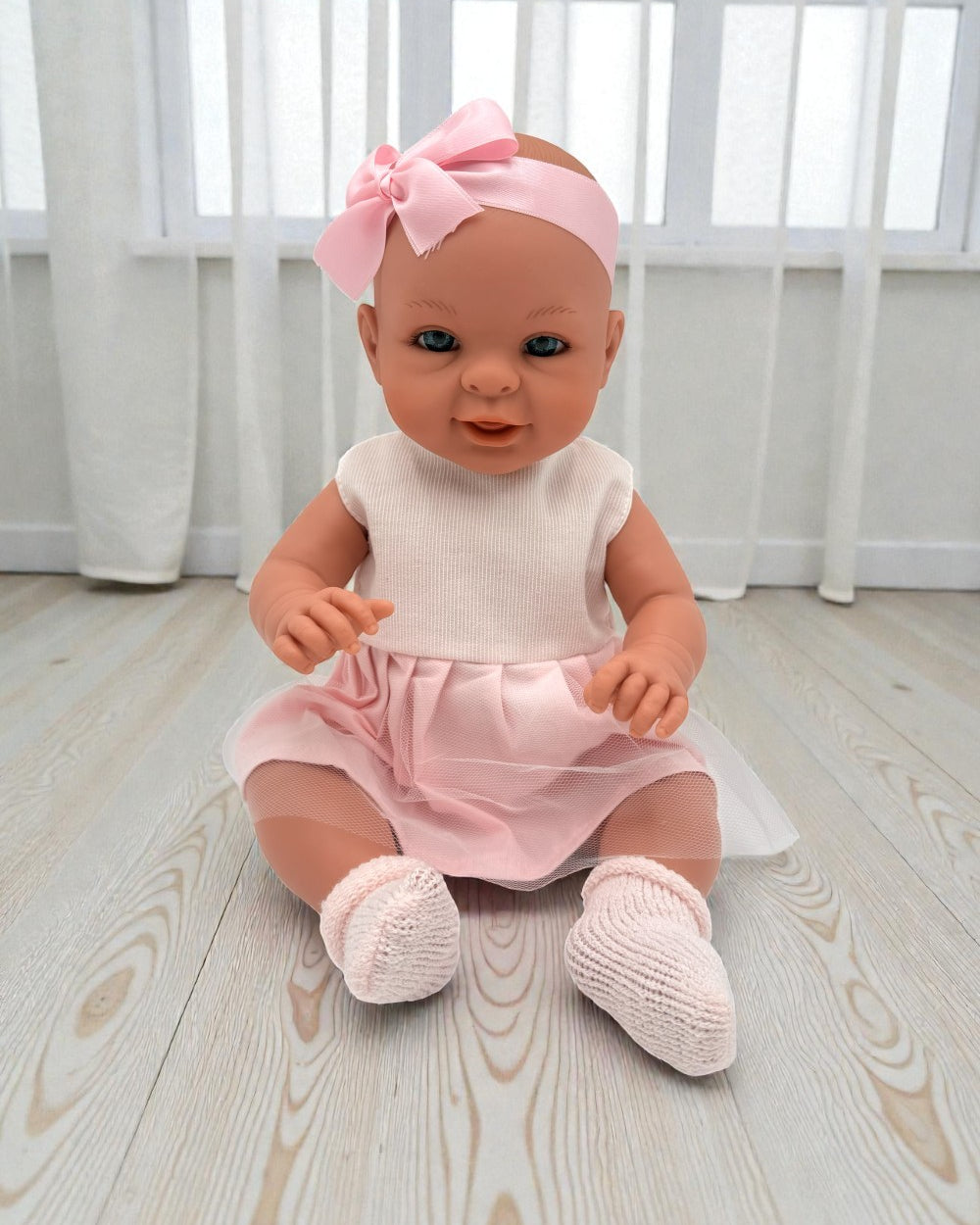 Handcrafted 18-inch Bebenita baby girl doll with hand-painted eyes in sweet pink dress