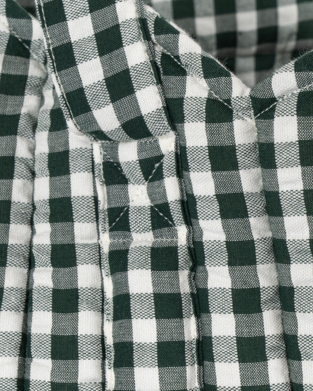Premium green and white check cotton construction showing durable weave and classic gingham pattern