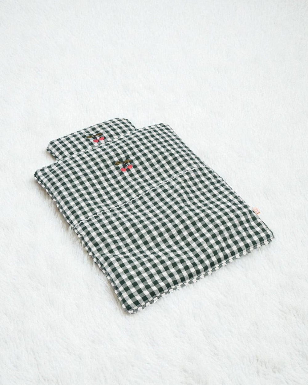 Green Check bedding set with classic gingham blanket and pillow arranged together showing coordinated farmhouse design