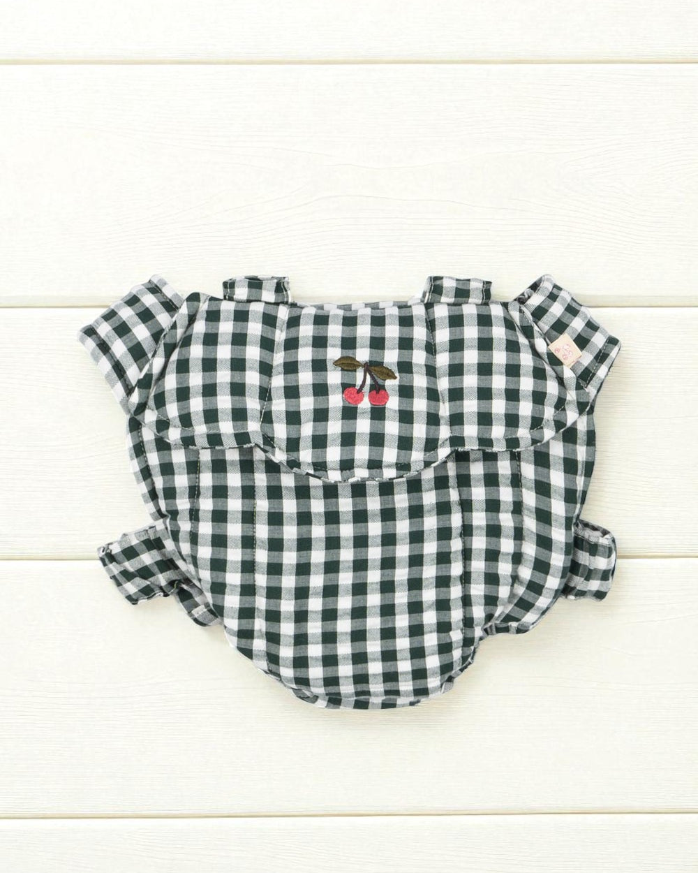 Green Check doll carrier with classic gingham pattern and comfortable scrunch straps for hands-free doll carrying