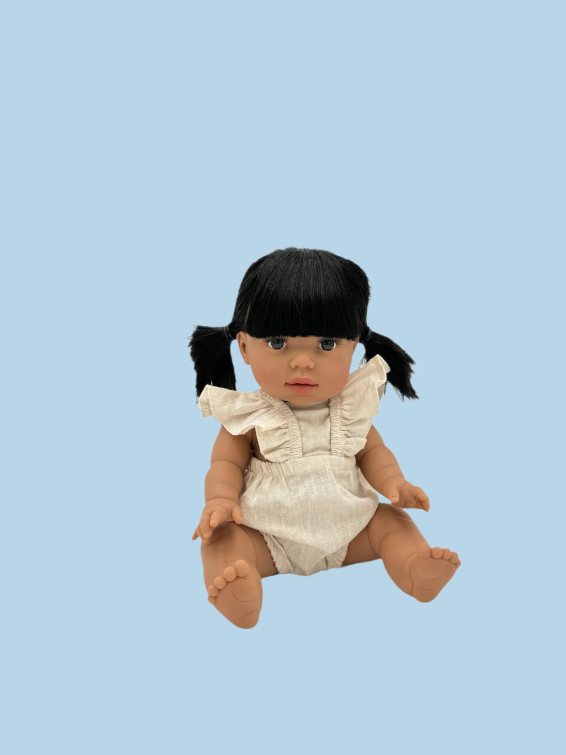 Doll outfit featuring detailed finishing touches