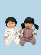 Celtic-inspired doll clothes with knotwork details