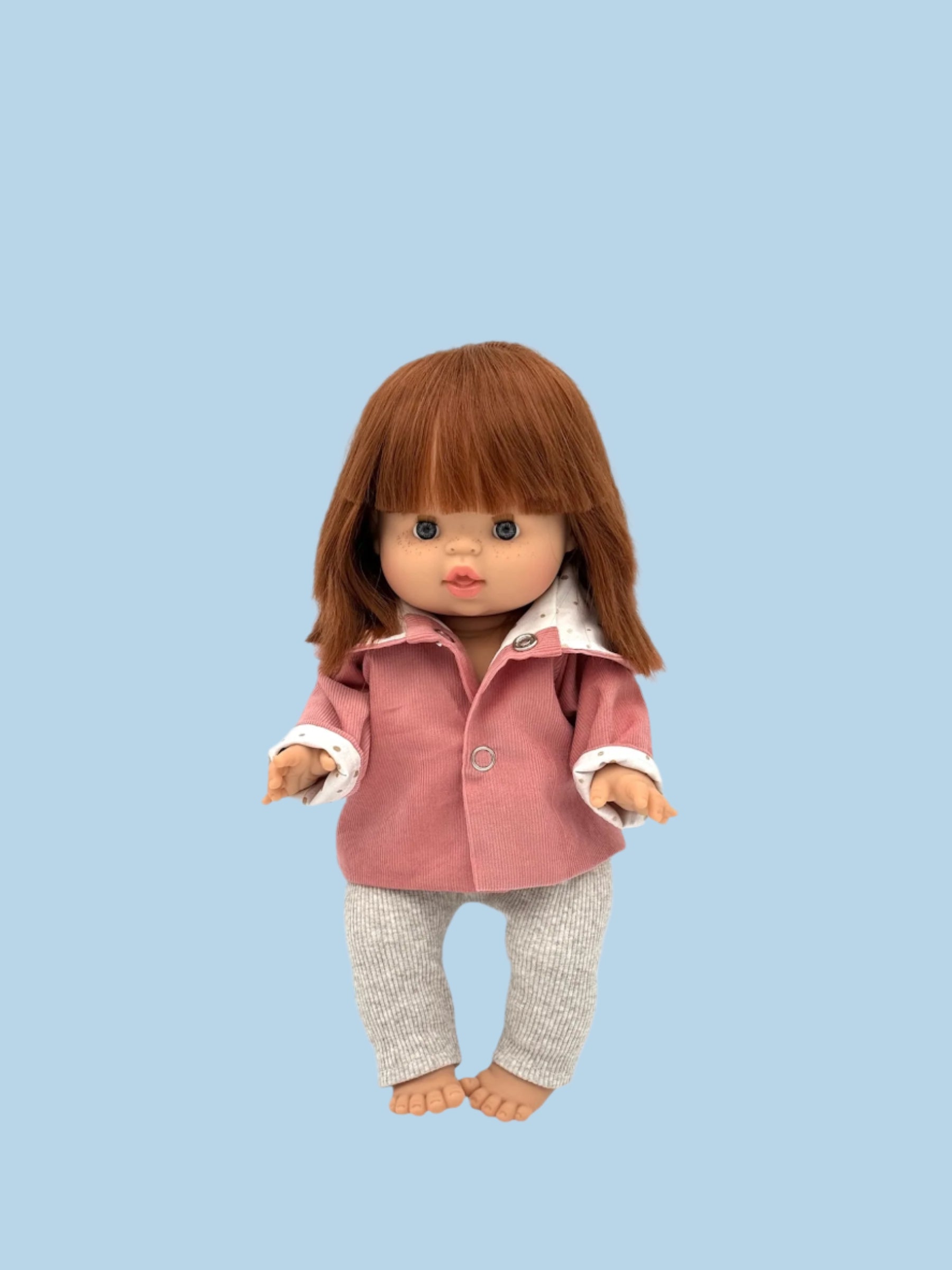 Doll coat with functioning pockets and buttons