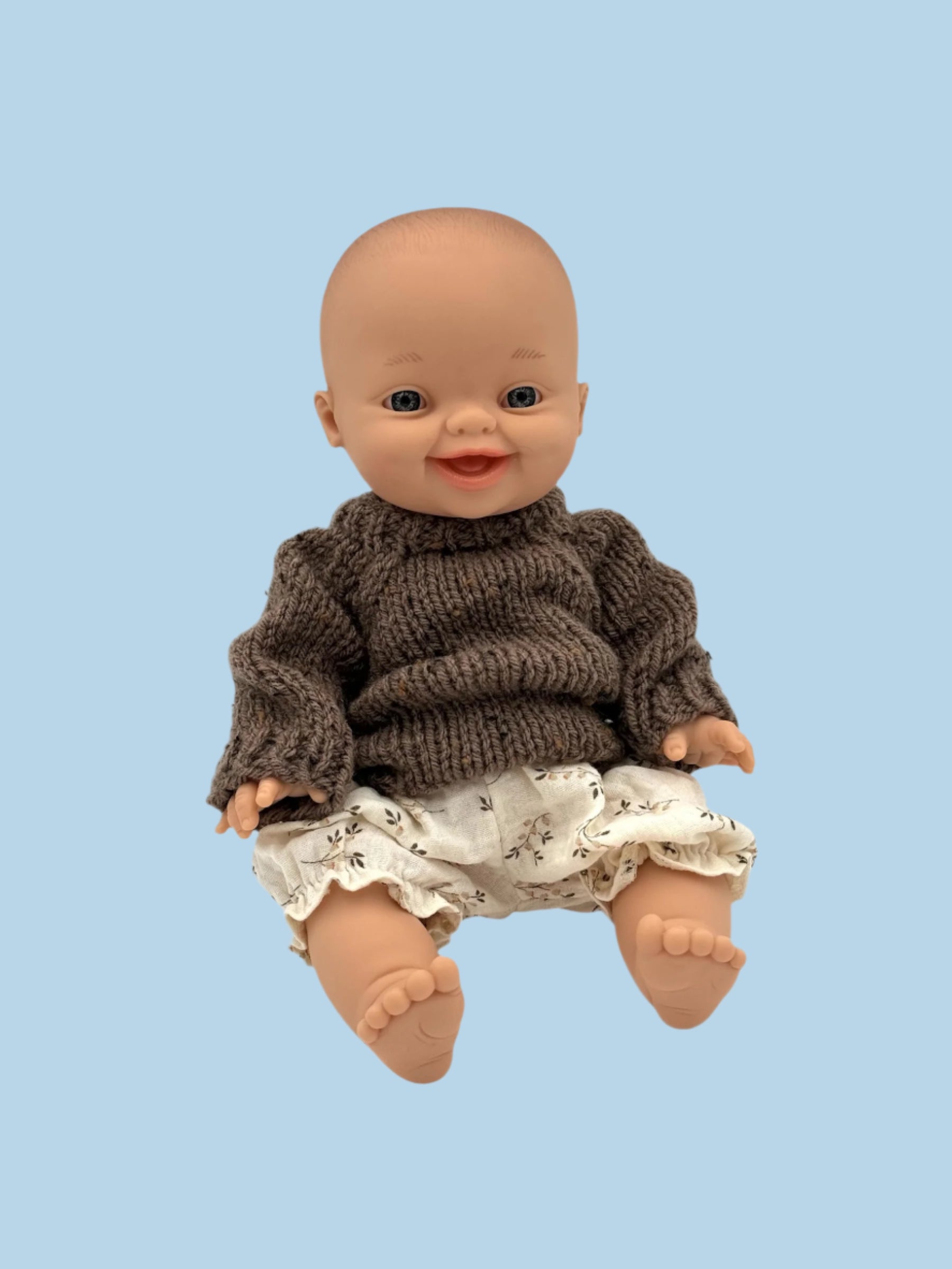 Antique doll clothes with period-appropriate design
