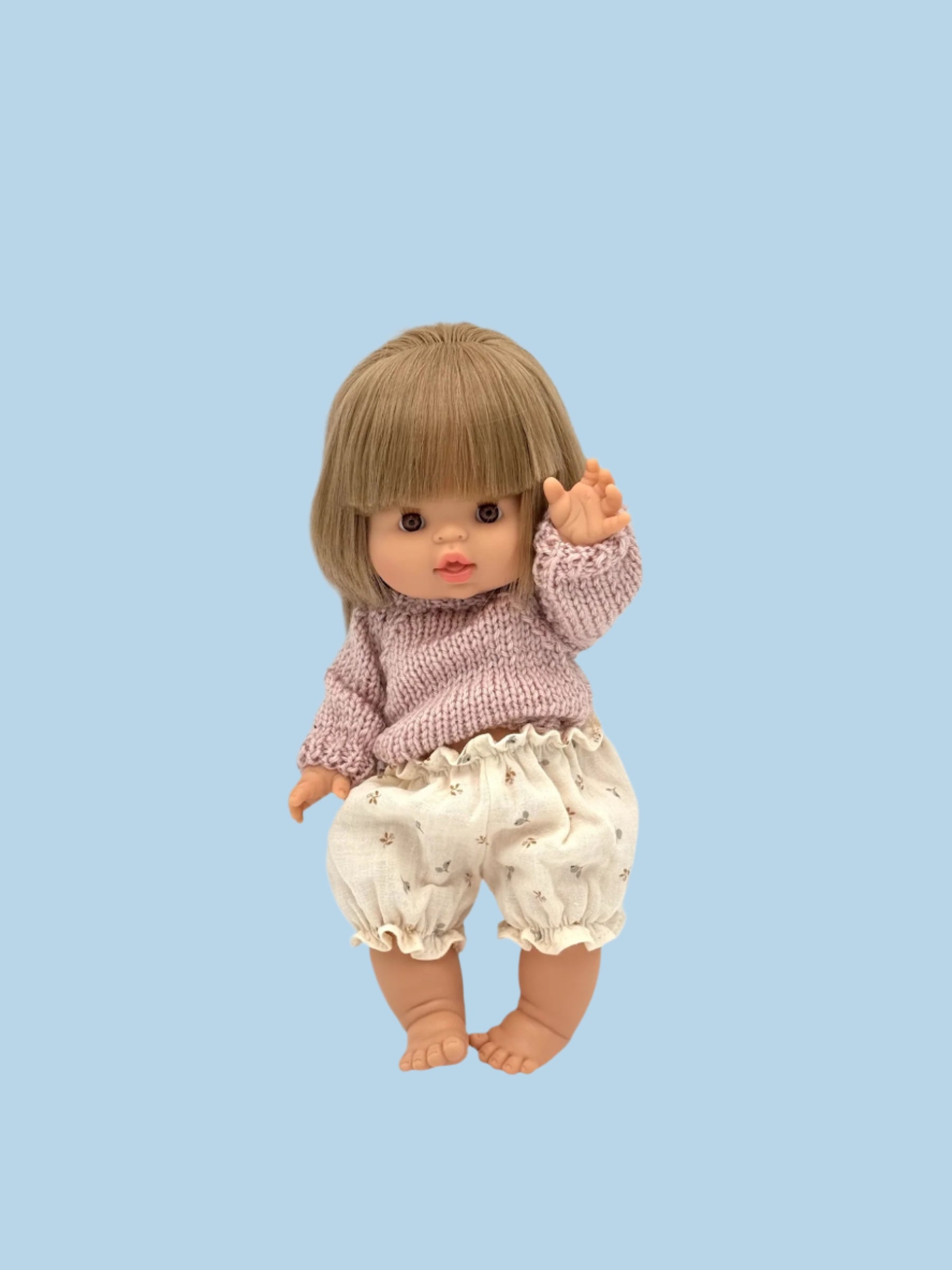 Reinforced seam doll fashion for active play