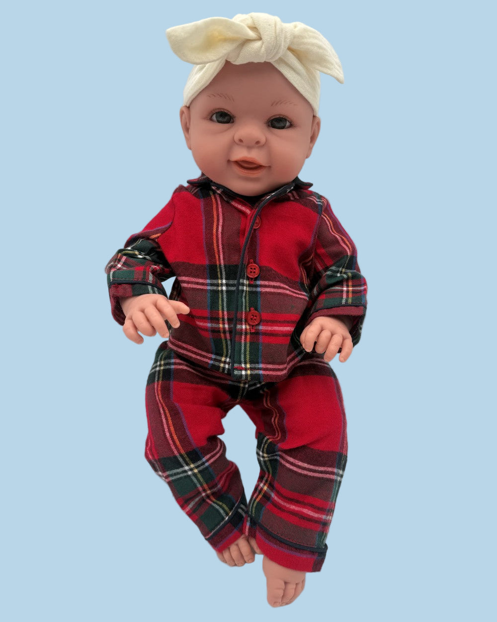 Traditional Scottish plaid doll pajamas with working buttons and elastic waist for realistic caregiving play