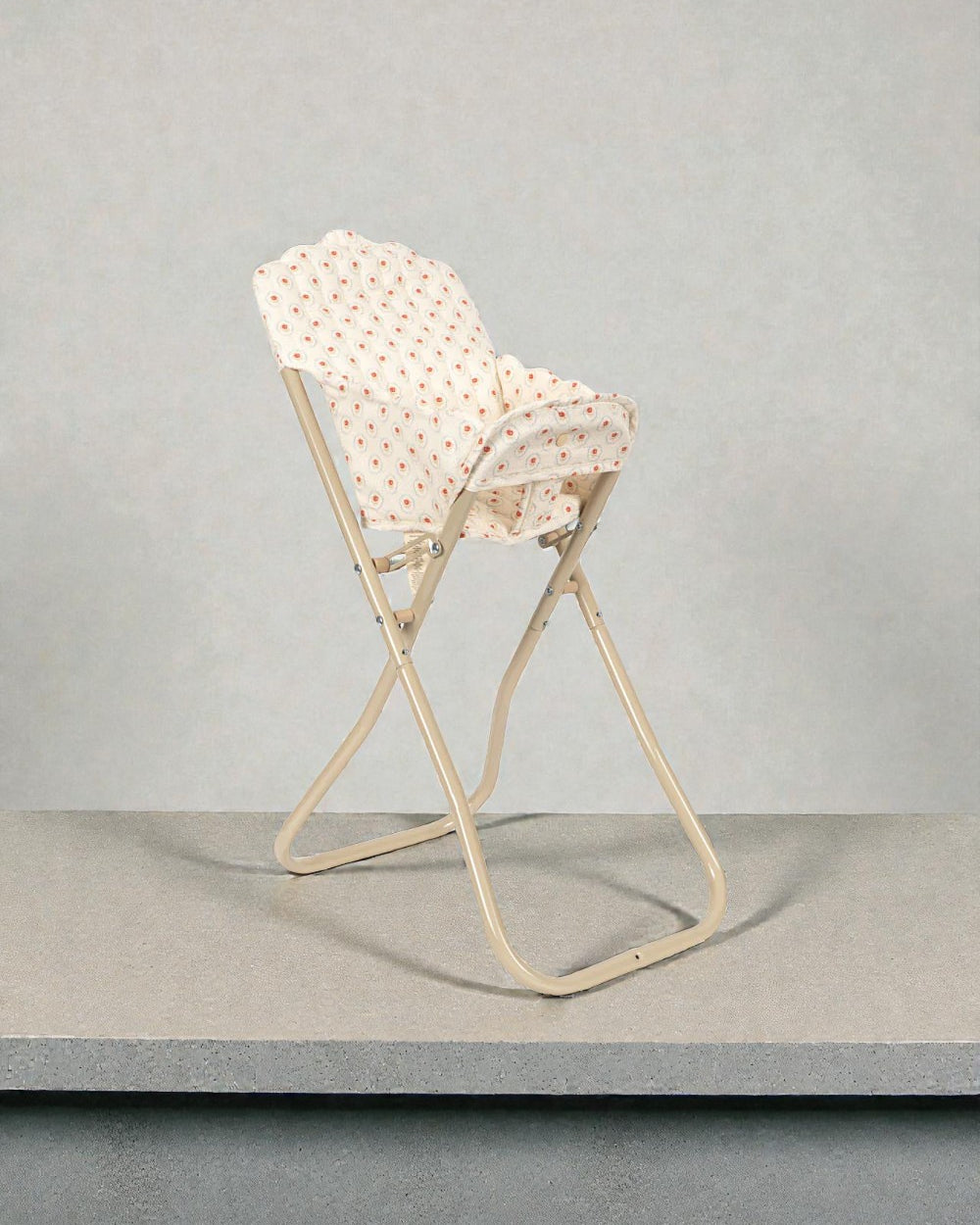 Red tulip pattern doll chair with velcro attachment and sturdy stable frame