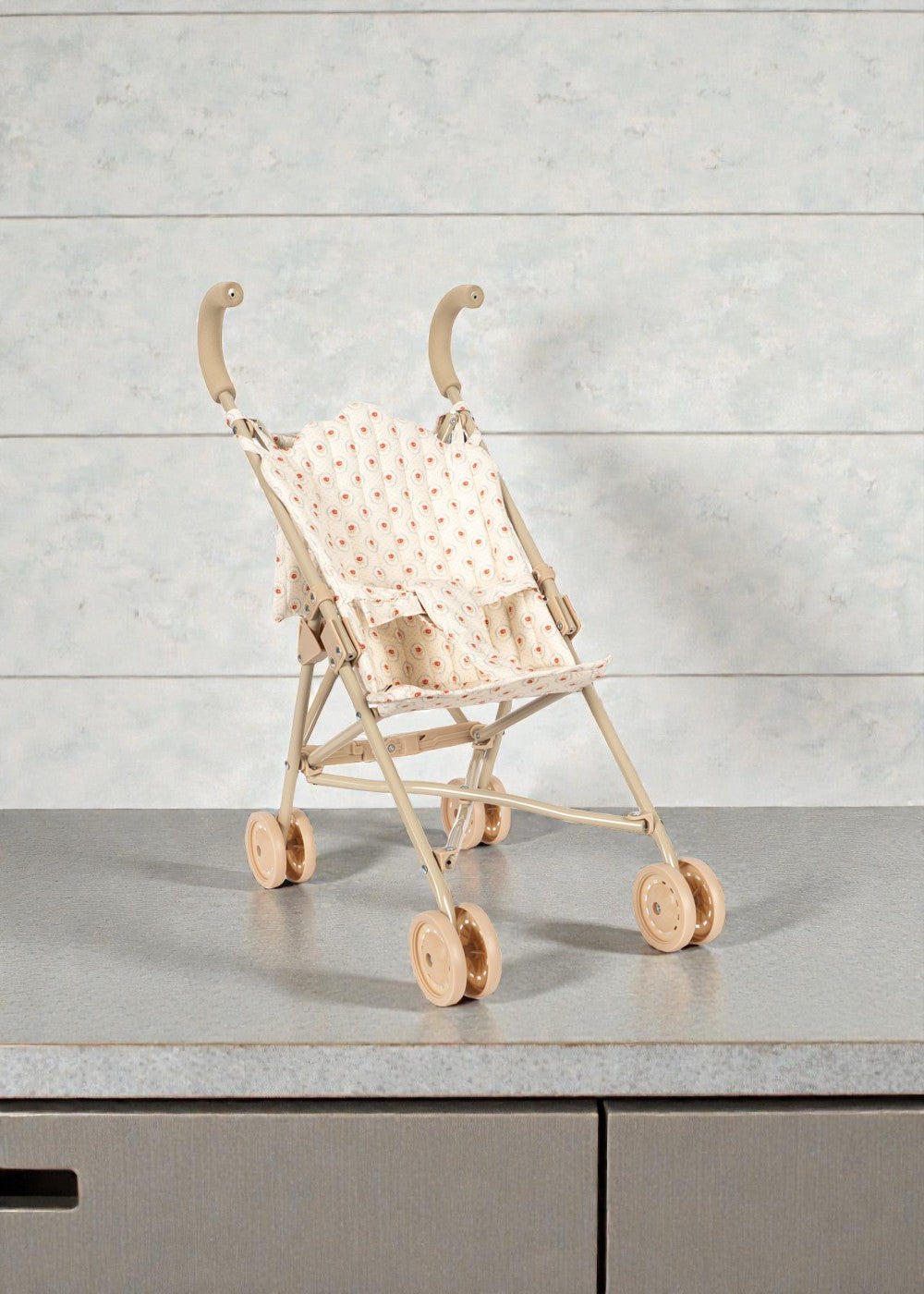 Konges Sløjd Mirage doll stroller with red tulip print and blue scalloped canopy