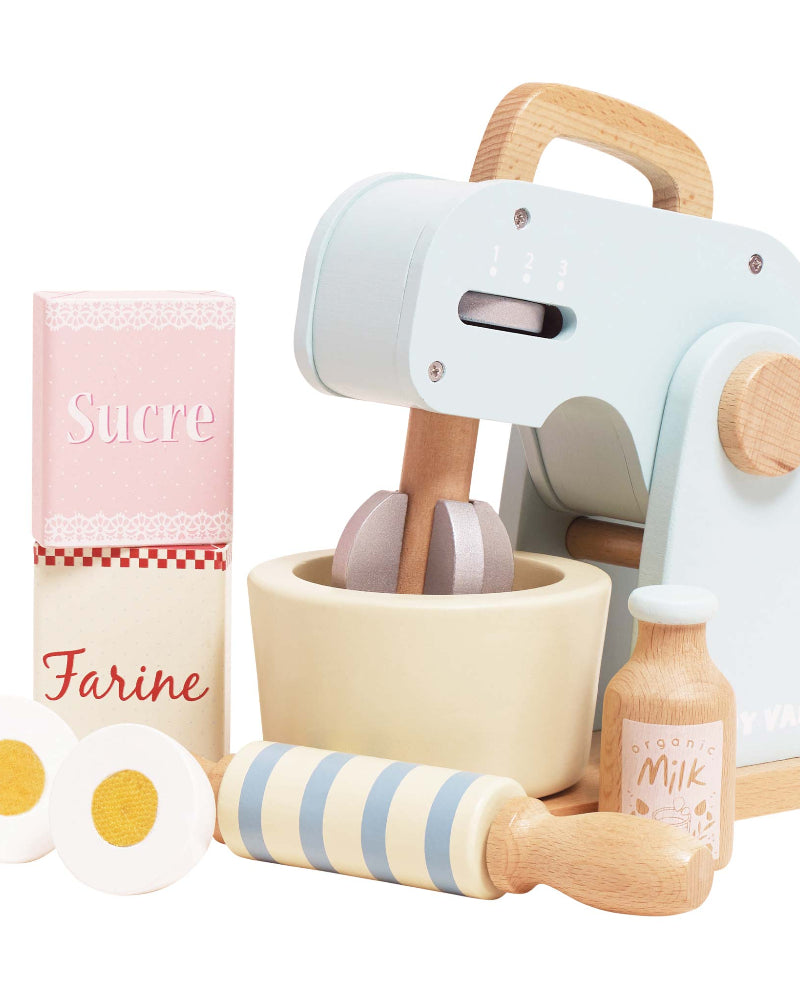 Close-up of FSC-certified wooden mixer showing working whisk mechanism