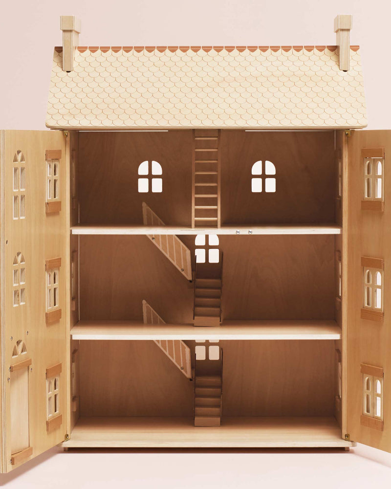 FSC-certified wooden dollhouse showing interior staircase and attic ladder