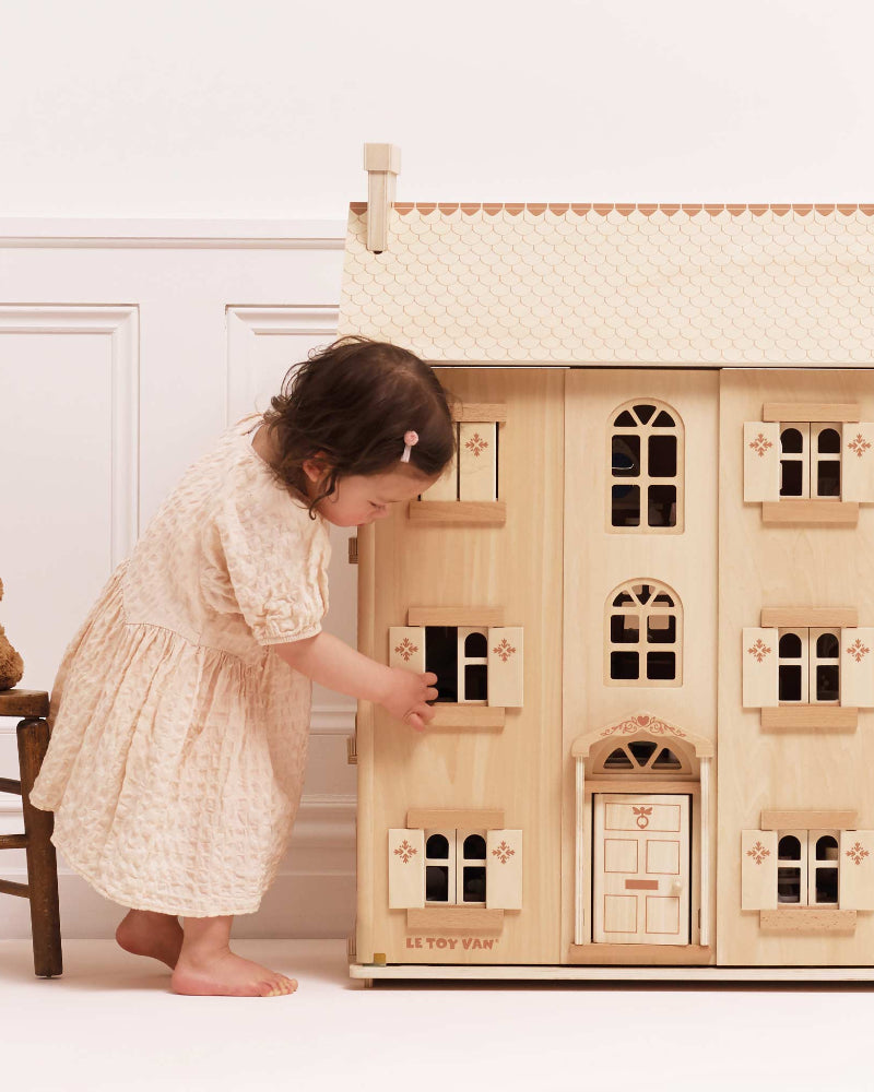 Complete view of Grand Dollhouse showing architectural details and rooms