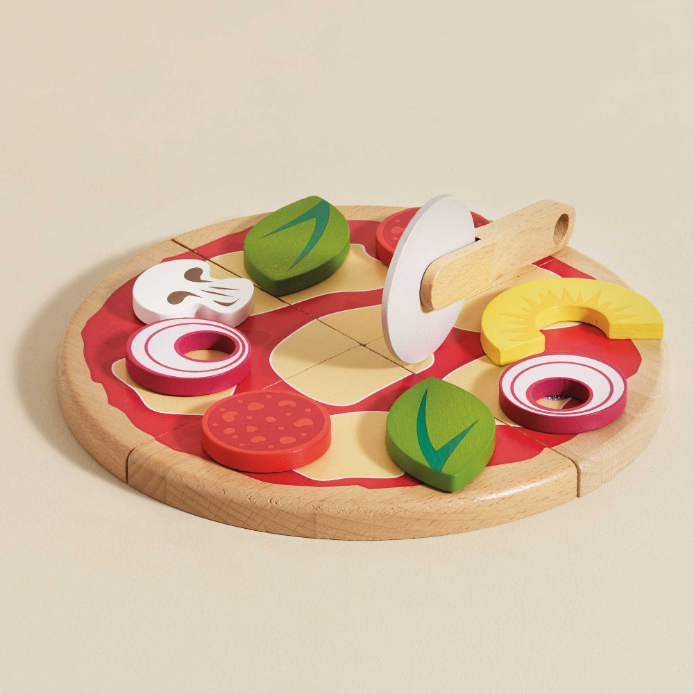 FSC certified wooden pizza toy showing individual slices and serving cutter